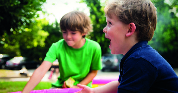 Children Playing Outside In Swimming Pool